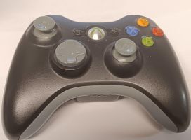 Xbox 360 Ohjain Musta Tateissa kulumaa