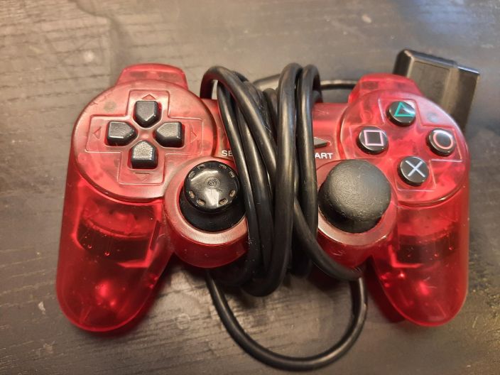 SONY dualshock punainen kaytetty PS2 AITO Sony Lapinakyva 1 kpl Tatin suojus puuttuu