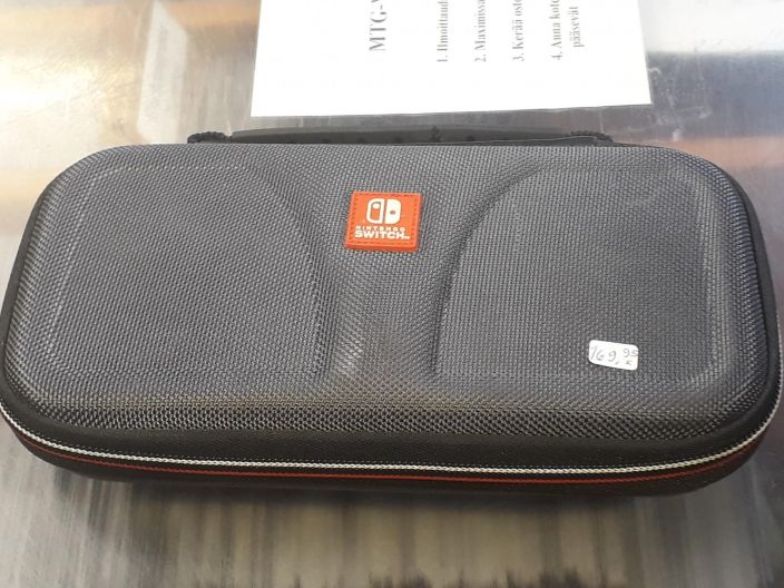 Nintendo Switch Lite Konsoli Harmaa Kaytetty Mukaan kuvassa oleva kotelo, ei sisalla laturia