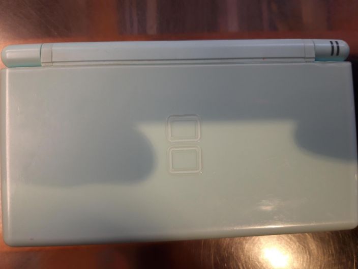 Nintendo DS lite turkoosi kaytetty kyna puuttuu